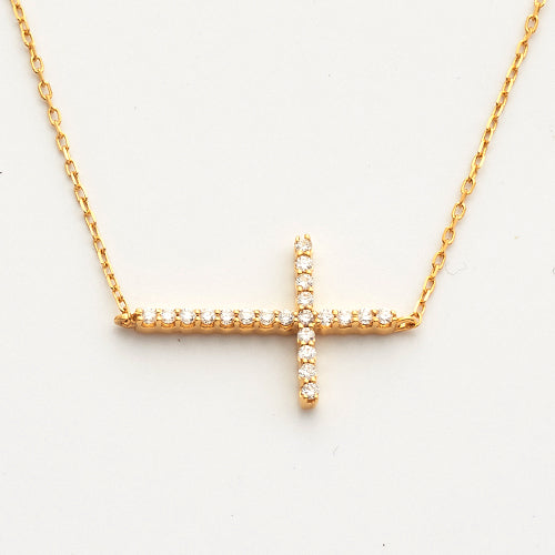 14KY 0.15CTW DIAMOND NECKLACE - SIDEWAYS CROSS